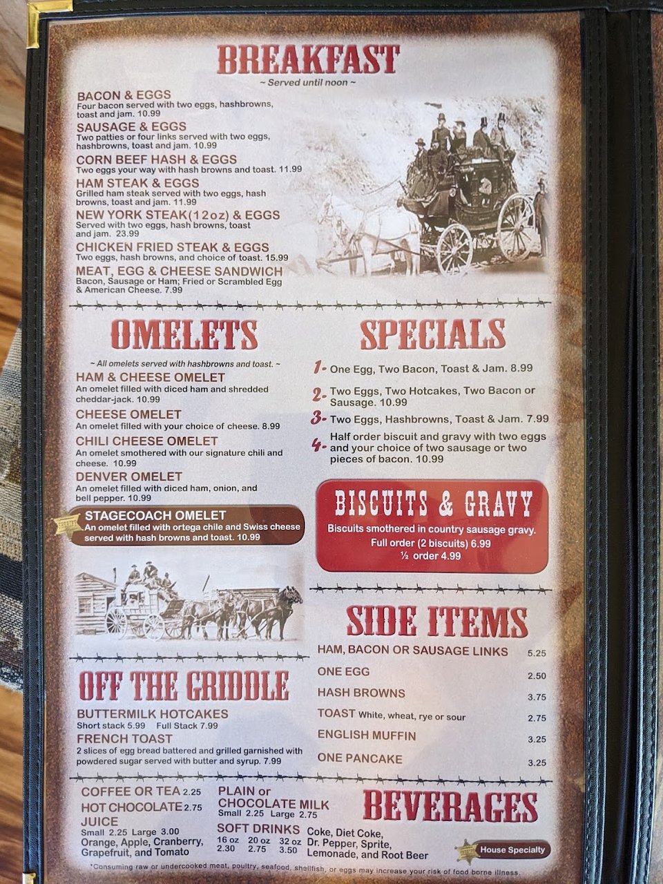 Breakfast menu with eggs, omelets, and hotcakes.